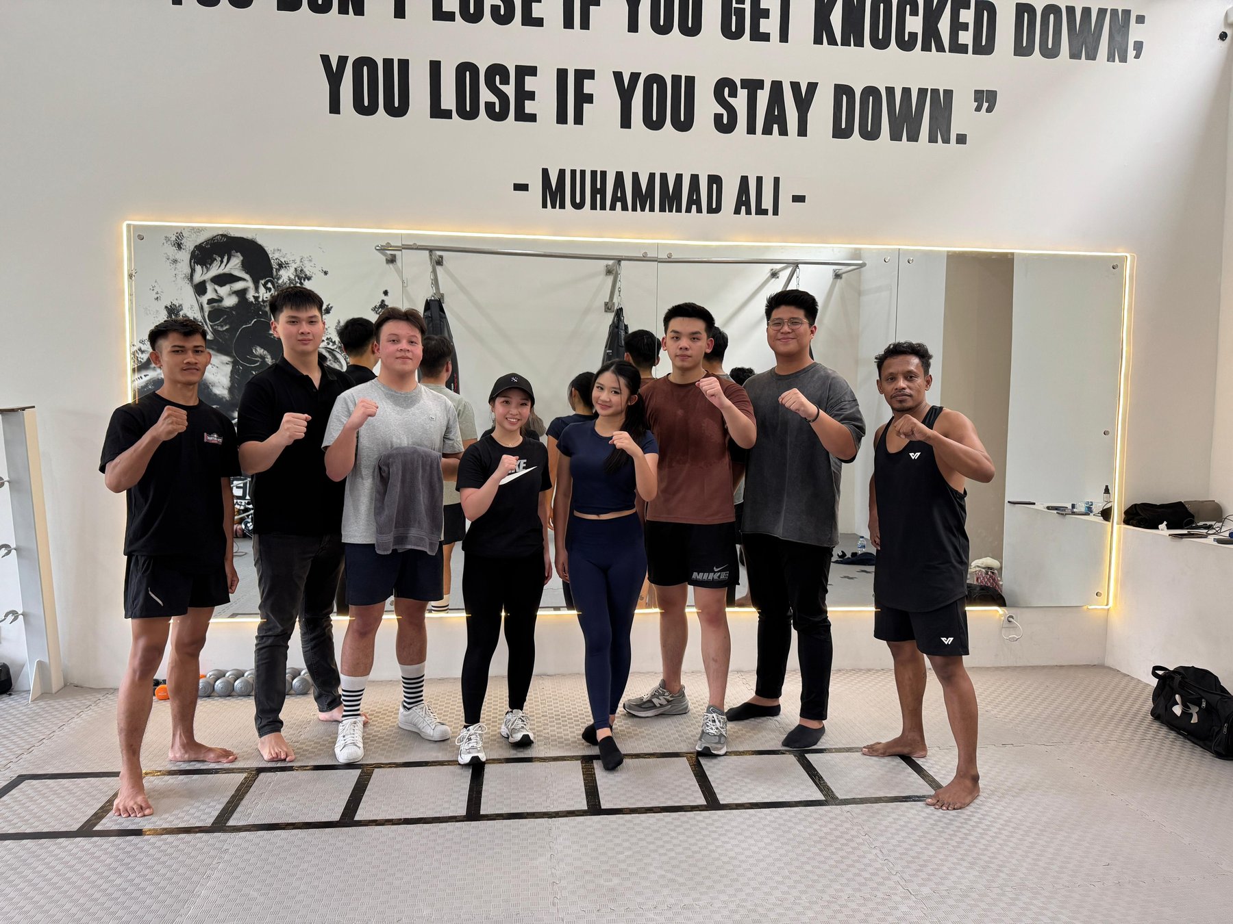 Group photo under the Ali quote